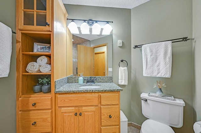 7111 Trenton Ln N, Maple Grove, MN 55369 - bathroom featuring toilet and vanity