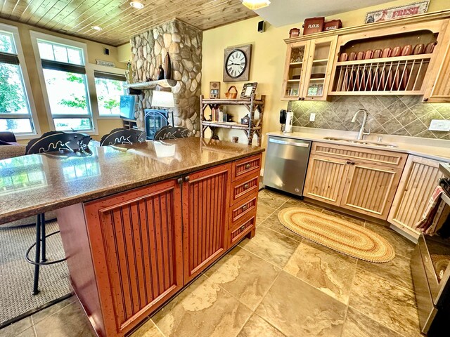6940 Beach View Ln NW Unit 220-1, Walker, MN 56484 - kitchen featuring dishwasher, wooden ceiling, backsplash, stone countertops, and glass insert cabinets