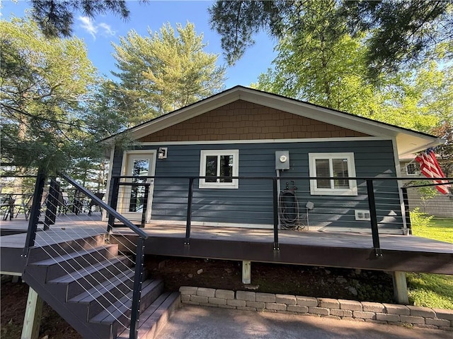N2590 Warren Rd, Madge Twp, WI 54870 - rear view of house featuring a wooden deck and stairway