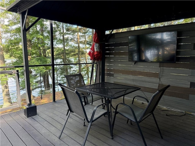 N2590 Warren Rd, Madge Twp, WI 54870 - wooden terrace with outdoor dining area