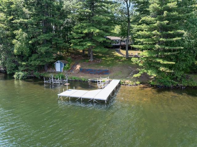 N2590 Warren Rd, Madge Twp, WI 54870 - dock area with stairs and a water view