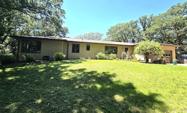 21200 5th St NW, Colfax Twp, MN 56273 - view of front of home with a garage and a front lawn
