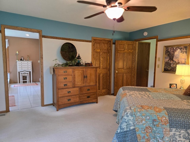 21200 5th St NW, Colfax Twp, MN 56273 - bedroom with light carpet and ceiling fan