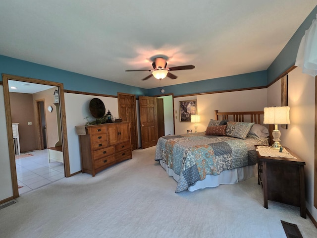 21200 5th St NW, Colfax Twp, MN 56273 - bedroom featuring light carpet and ceiling fan