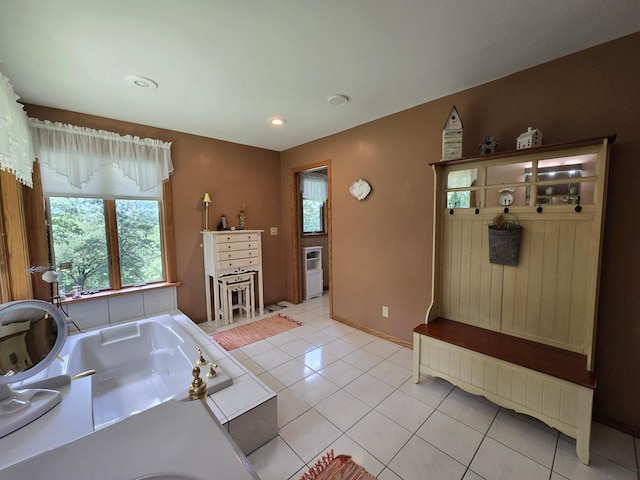 21200 5th St NW, Colfax Twp, MN 56273 - bathroom with a bath, tile patterned flooring, and recessed lighting