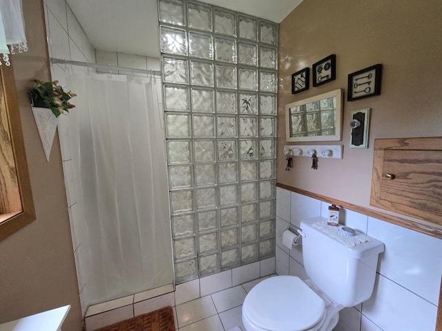 21200 5th St NW, Colfax Twp, MN 56273 - bathroom with tiled shower, tile patterned floors, and tile walls