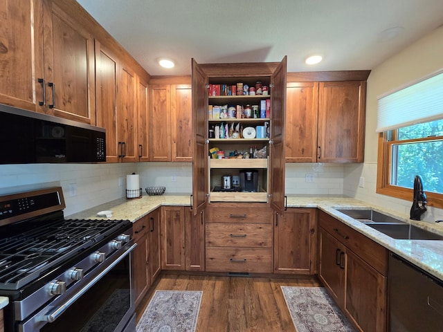 21200 5th St NW, Colfax Twp, MN 56273 - kitchen with appliances with stainless steel finishes, dark wood-type flooring, open shelves, backsplash, and recessed lighting