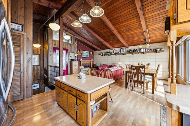 13235 80th St NW, Annandale, MN 55302 - kitchen featuring wood ceiling, light wood-type flooring, fridge, wooden walls, and light countertops