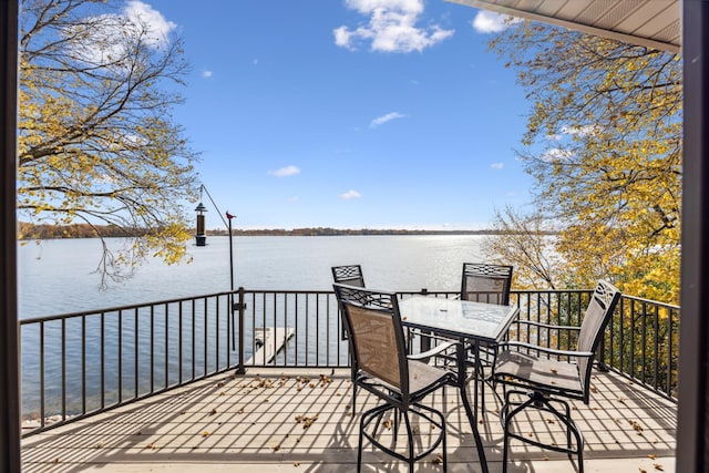 13235 80th St NW, Annandale, MN 55302 - deck with a water view and outdoor dining area