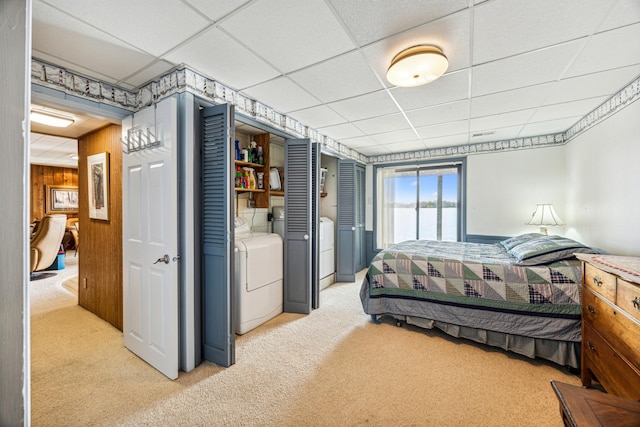 13235 80th St NW, Annandale, MN 55302 - carpeted bedroom with a paneled ceiling and washer / dryer