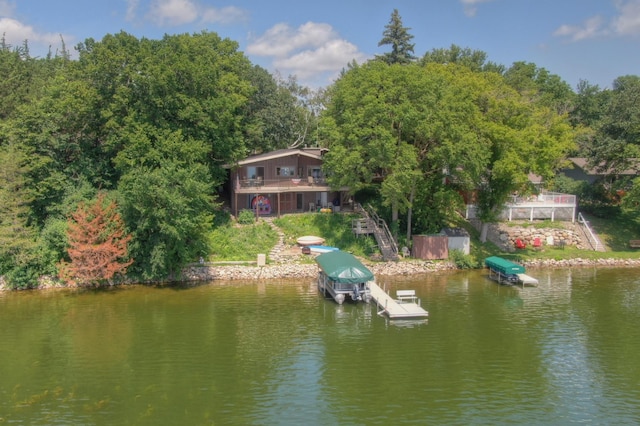 13235 80th St NW, Annandale, MN 55302 - dock area featuring stairway, a water view, and boat lift