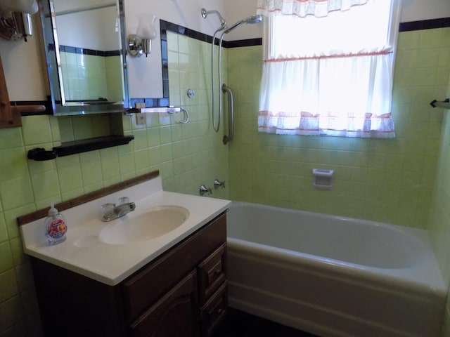 411 Bush St, Lakefield, MN 56150 - bathroom featuring tile walls, shower / tub combination, and vanity