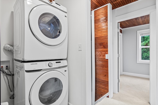 2168 Centerview Ln, Mound, MN 55364 - laundry area with wood ceiling, estacked washer and dryer, and carpet
