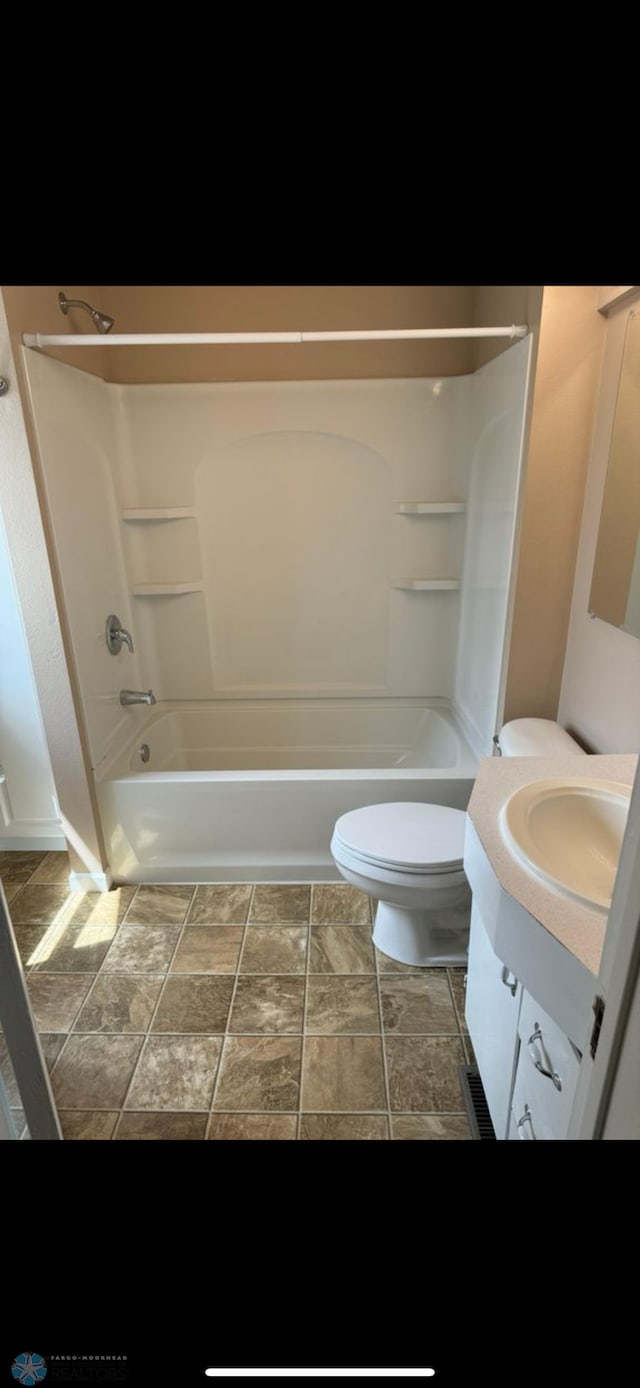 802 11th Ave N, Fargo, ND 58102 - full bath featuring vanity and tub / shower combination