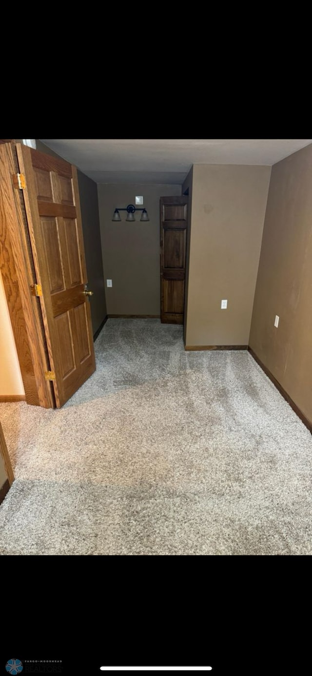 802 11th Ave N, Fargo, ND 58102 - unfurnished room with carpet floors