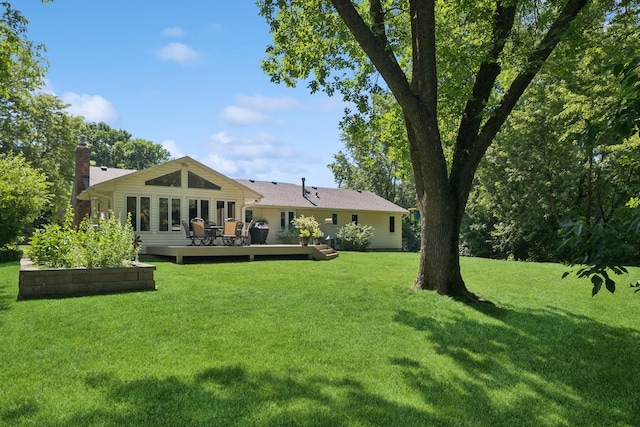 10316 Zinran Ave S, Bloomington, MN 55438 - rear view of property featuring a wooden deck and a lawn