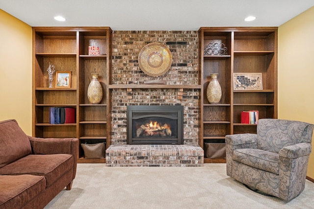 10316 Zinran Ave S, Bloomington, MN 55438 - living room featuring carpet, built in features, a fireplace, and recessed lighting