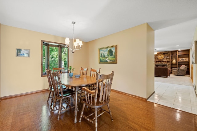10316 Zinran Ave S, Bloomington, MN 55438 - dining space with a chandelier and light wood-type flooring