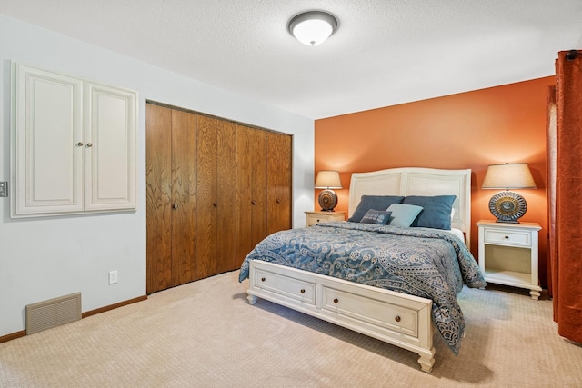 10316 Zinran Ave S, Bloomington, MN 55438 - bedroom with carpet, a closet, and a textured ceiling