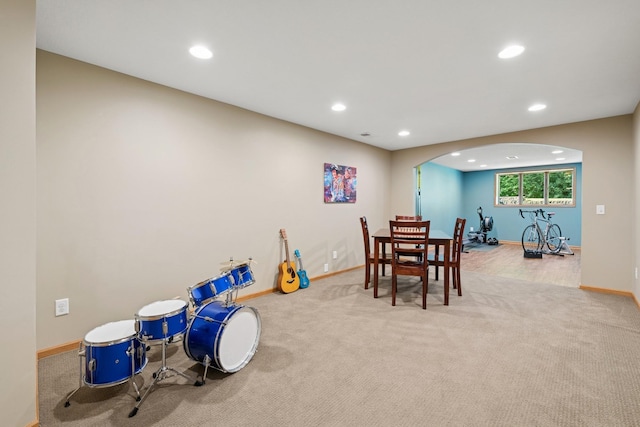10316 Zinran Ave S, Bloomington, MN 55438 - recreation room with arched walkways, recessed lighting, and carpet flooring