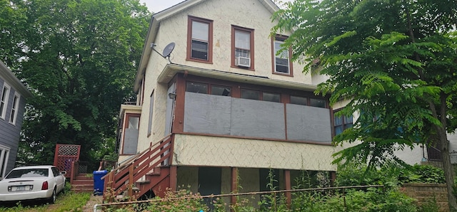 713 Preble St, Saint Paul, MN 55130 - view of home's exterior with stucco siding