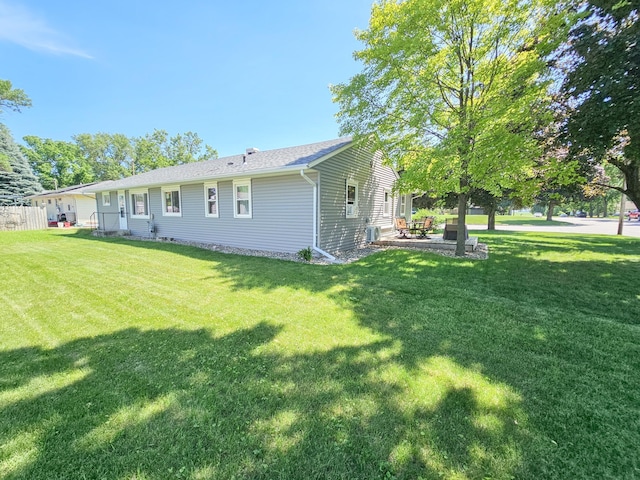 460 3rd St, Bird Island, MN 55310 - back of property with a yard and a patio