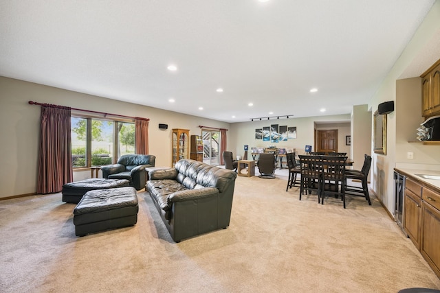 13703 47th St NE, Saint Michael, MN 55376 - living room featuring light carpet, recessed lighting, wine cooler, and bar