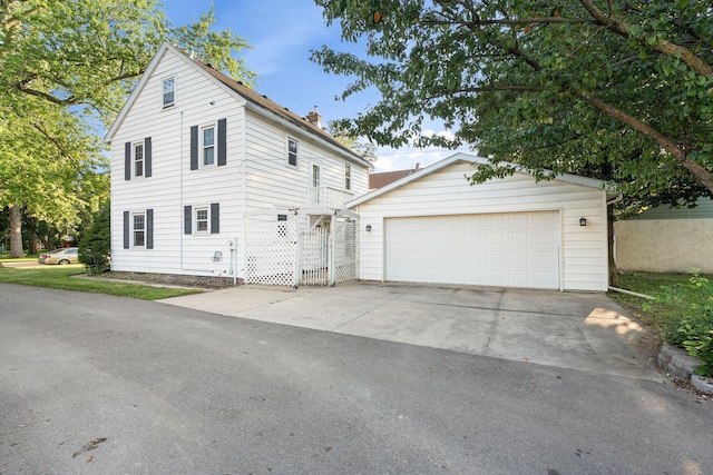 506 6th Ave SW, Austin, MN 55912 - view of front of home with a chimney and an outdoor structure