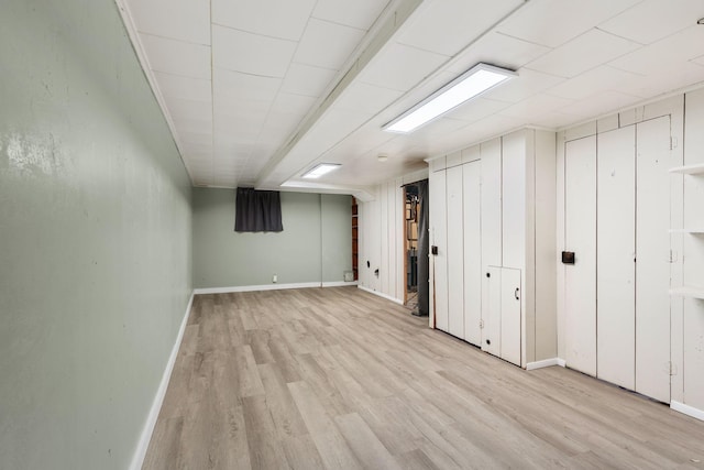 506 6th Ave SW, Austin, MN 55912 - finished basement featuring light wood-style floors and baseboards