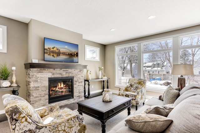 3163 Christopher Ln, Shoreview, MN 55126 - living area featuring a stone fireplace and recessed lighting