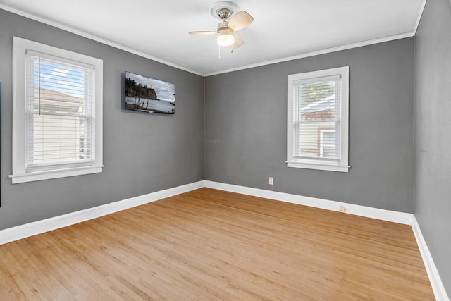1502 Maywood St, Saint Paul, MN 55117 - spare room with crown molding, ceiling fan, and wood finished floors