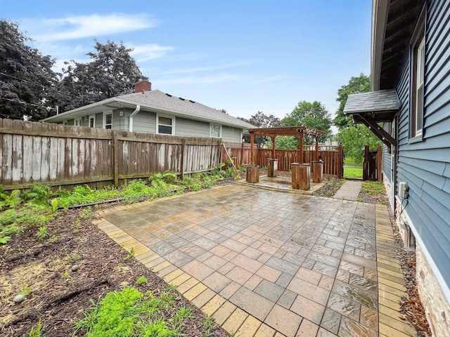 1502 Maywood St, Saint Paul, MN 55117 - fenced backyard featuring a patio and a pergola