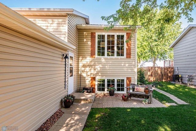 3746 10th St N, Fargo, ND 58102 - back of property with a patio area and outdoor lounge area