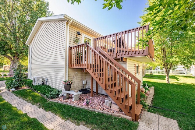 3746 10th St N, Fargo, ND 58102 - view of side of property with a wooden deck and stairway