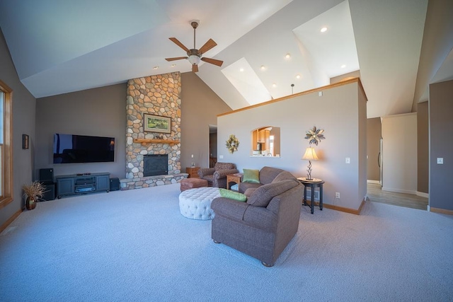 35337 County 24th Blvd, Warsaw Twp, MN 55009 - living area featuring carpet, a ceiling fan, high vaulted ceiling, a stone fireplace, and recessed lighting