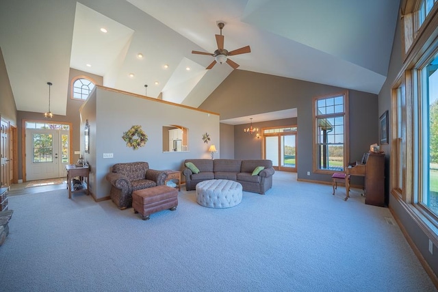 35337 County 24th Blvd, Warsaw Twp, MN 55009 - living room featuring light colored carpet, high vaulted ceiling, a ceiling fan, a chandelier, and recessed lighting