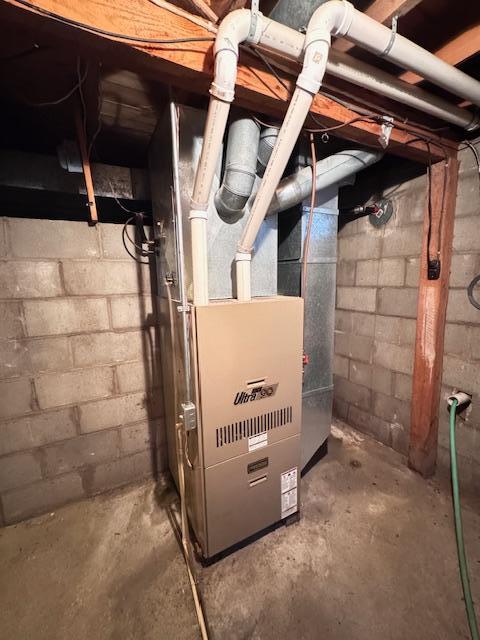 317 2nd St NE, Menahga, MN 56464 - utility room with heating unit