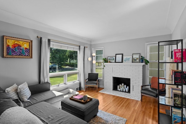 5712 Grand Ave S, Minneapolis, MN 55419 - living room featuring wood finished floors and a brick fireplace