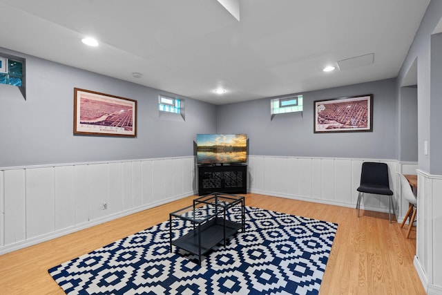 5712 Grand Ave S, Minneapolis, MN 55419 - sitting room with wood finished floors, a wainscoted wall, and recessed lighting