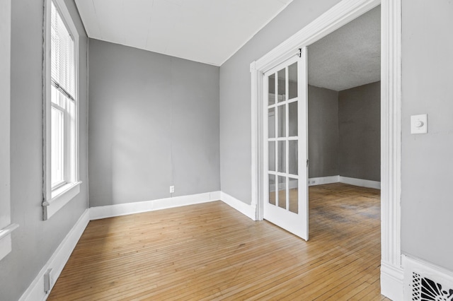 515 Lincoln St, Winona, MN 55987 - empty room featuring light wood-style floors and baseboards