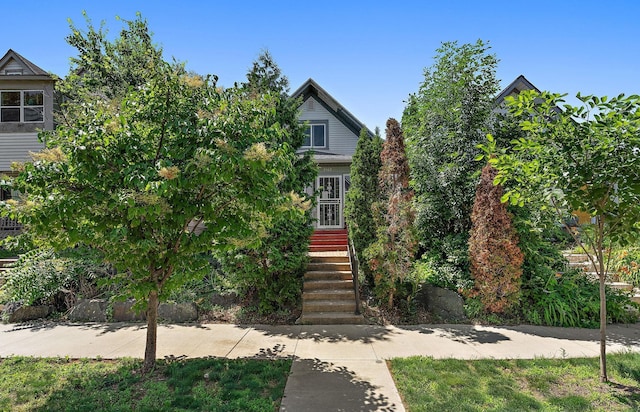 3502 Grand Ave S, Minneapolis, MN 55408 - view of property hidden behind natural elements with stairs