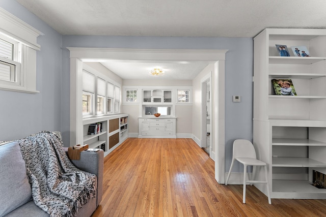 3502 Grand Ave S, Minneapolis, MN 55408 - sitting room with light wood-type flooring and baseboards