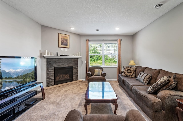 4870 Copper Ridge Dr, Woodbury, MN 55129 - carpeted living area featuring a textured ceiling, a stone fireplace, and recessed lighting
