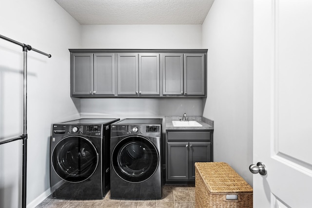 4870 Copper Ridge Dr, Woodbury, MN 55129 - washroom with cabinet space, separate washer and dryer, and a textured ceiling