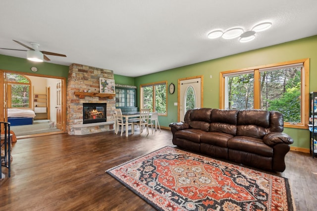 1610 63rd St, Chanhassen, MN 55331 - living room featuring wood finished floors, ceiling fan, and healthy amount of natural light