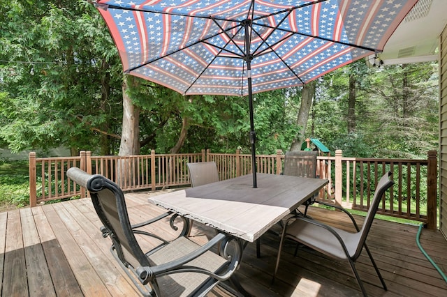 1610 63rd St, Chanhassen, MN 55331 - wooden terrace with outdoor dining space