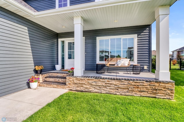 6176 Marigold Loop S, Fargo, ND 58104 - doorway to property with covered porch