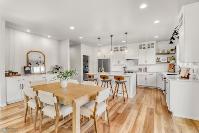 6176 Marigold Loop S, Fargo, ND 58104 - dining area with light wood-style flooring and recessed lighting
