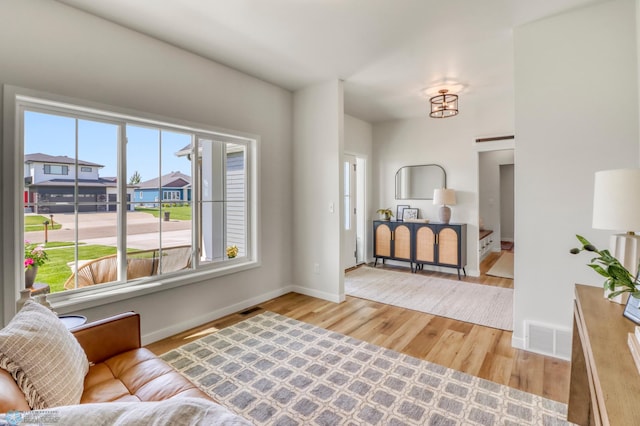 6176 Marigold Loop S, Fargo, ND 58104 - living room featuring wood finished floors and baseboards