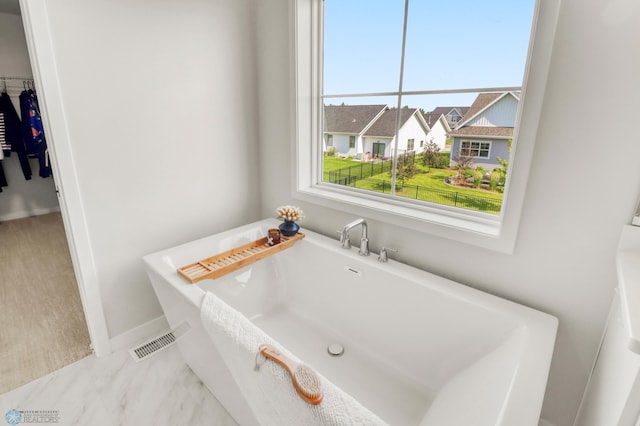 6176 Marigold Loop S, Fargo, ND 58104 - bathroom with a freestanding tub